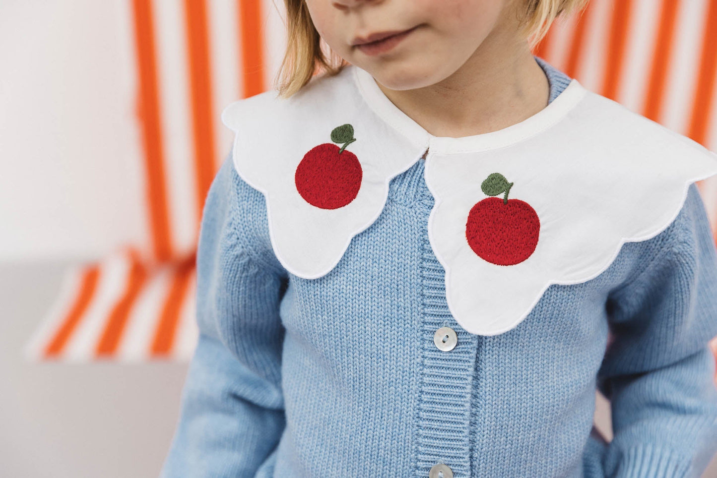 Blue conference collar with apple patterns
