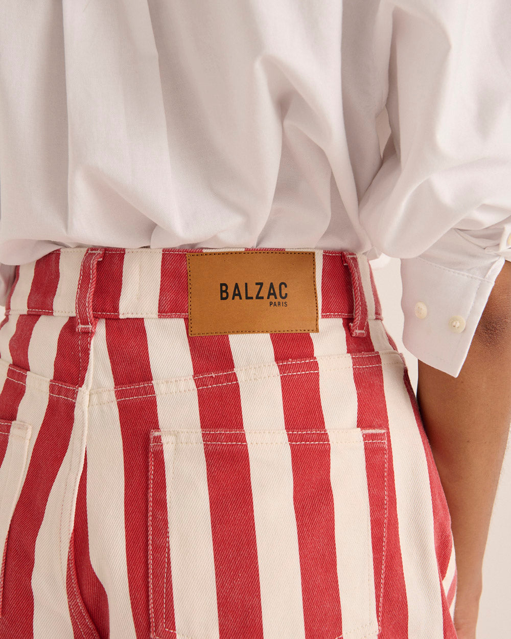 Triomphe red and white striped shorts