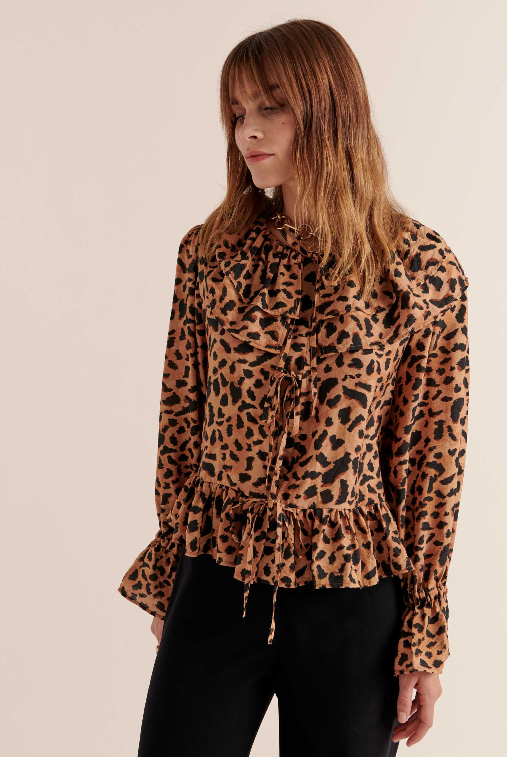 Sac à main en cuir imprimé guépard
