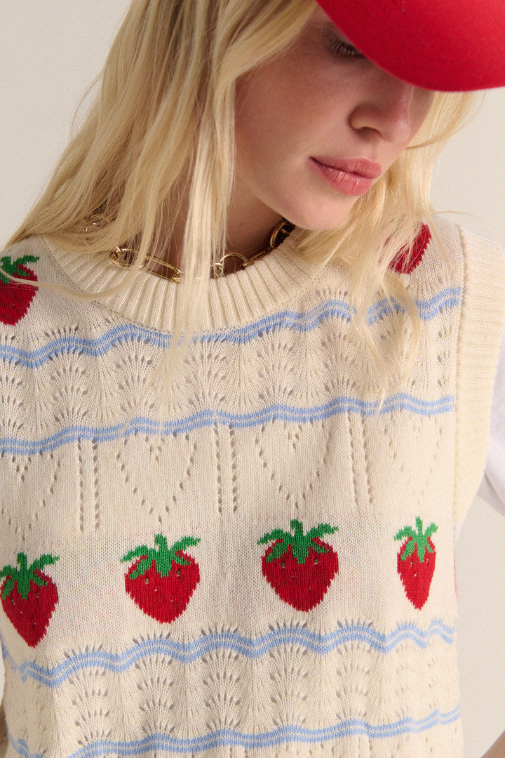 Priska ecru sweater and red strawberries