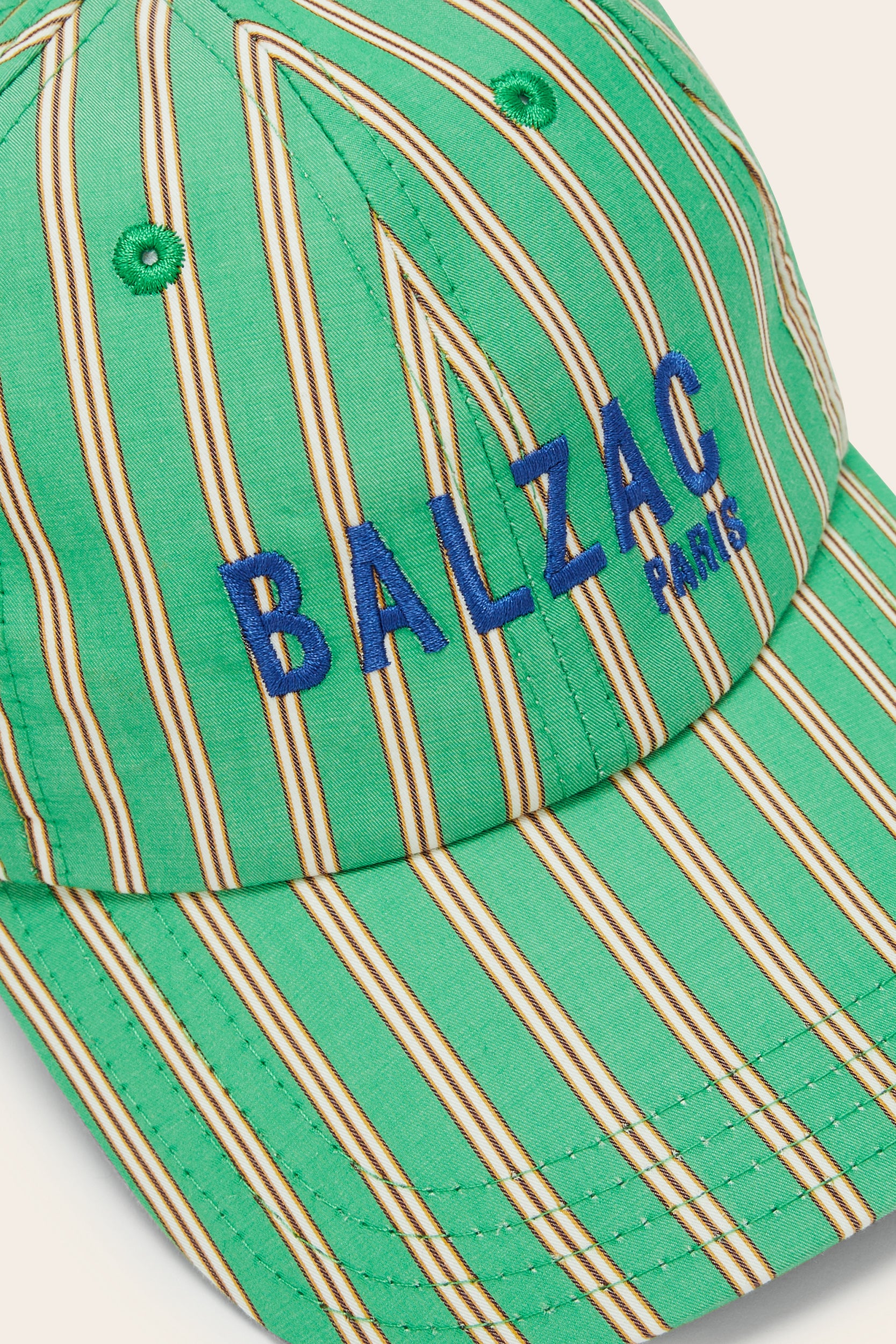 Espoir cap with green and navy stripes