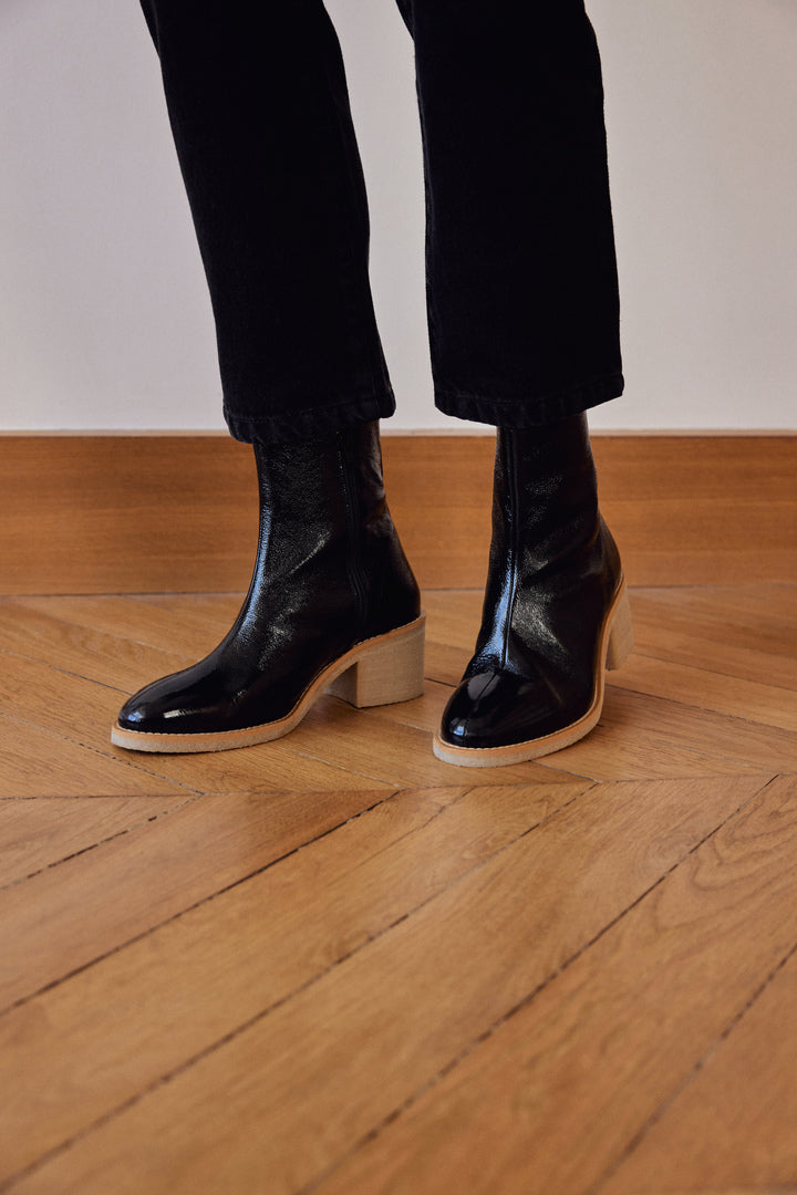 black crumpled patent leather ankle boots