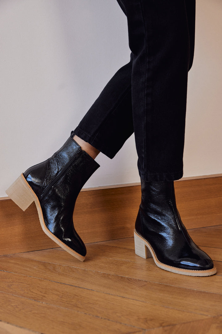 black crumpled patent leather ankle boots