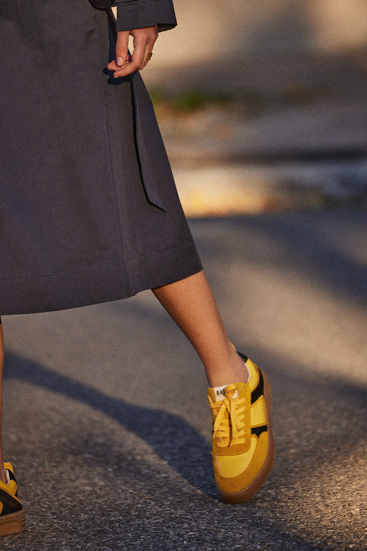 Yellow and black Colette sneakers