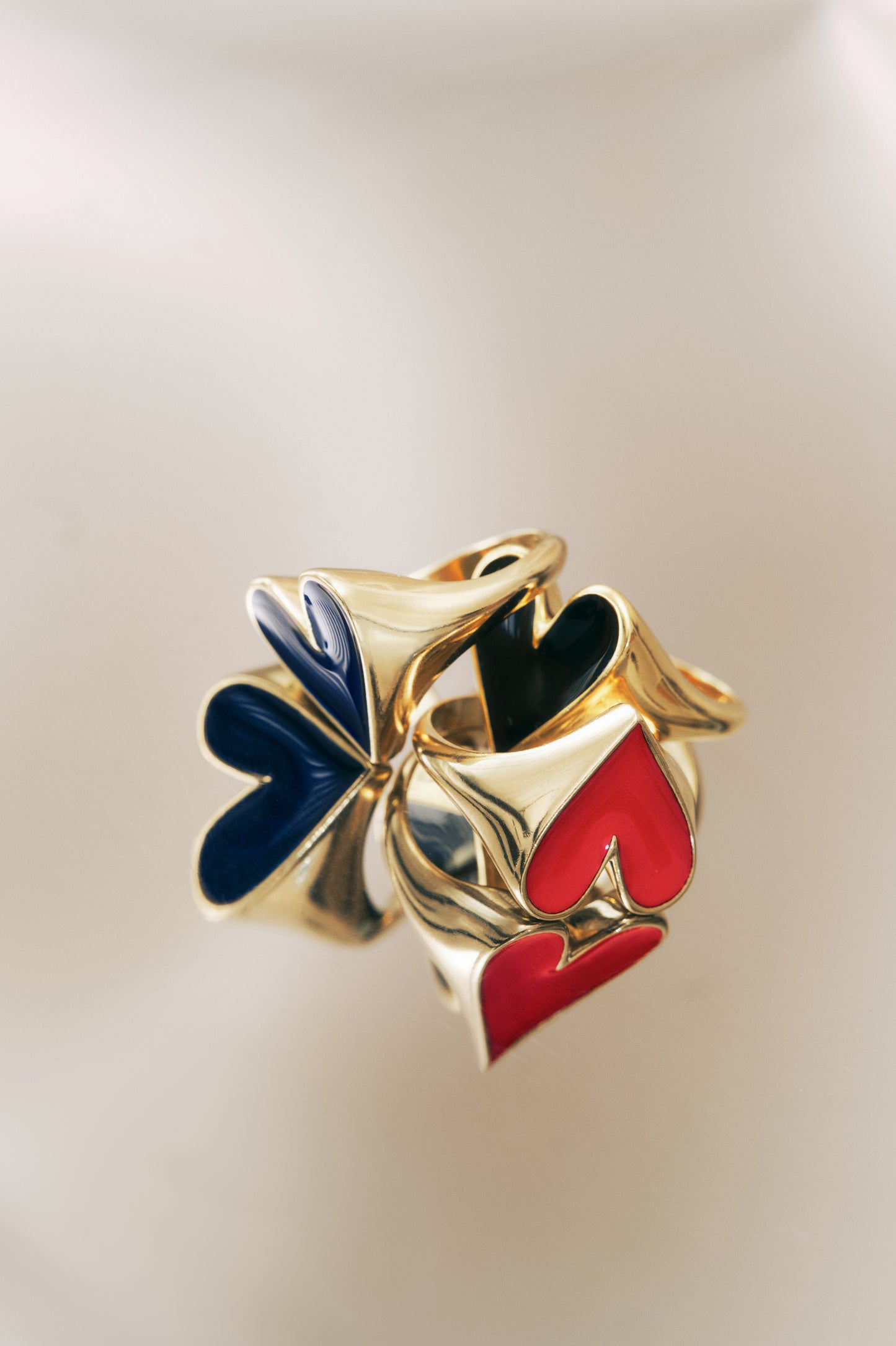 Gold Faustine ring with black heart