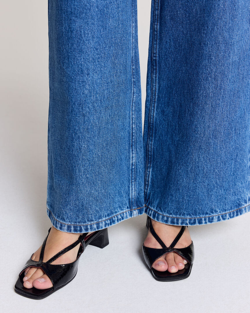 Black embossed patent leather Tella sandals