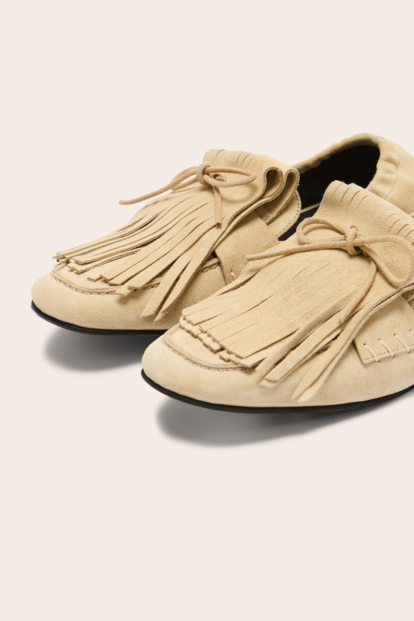 Alix fringed loafers in sand-colored split leather