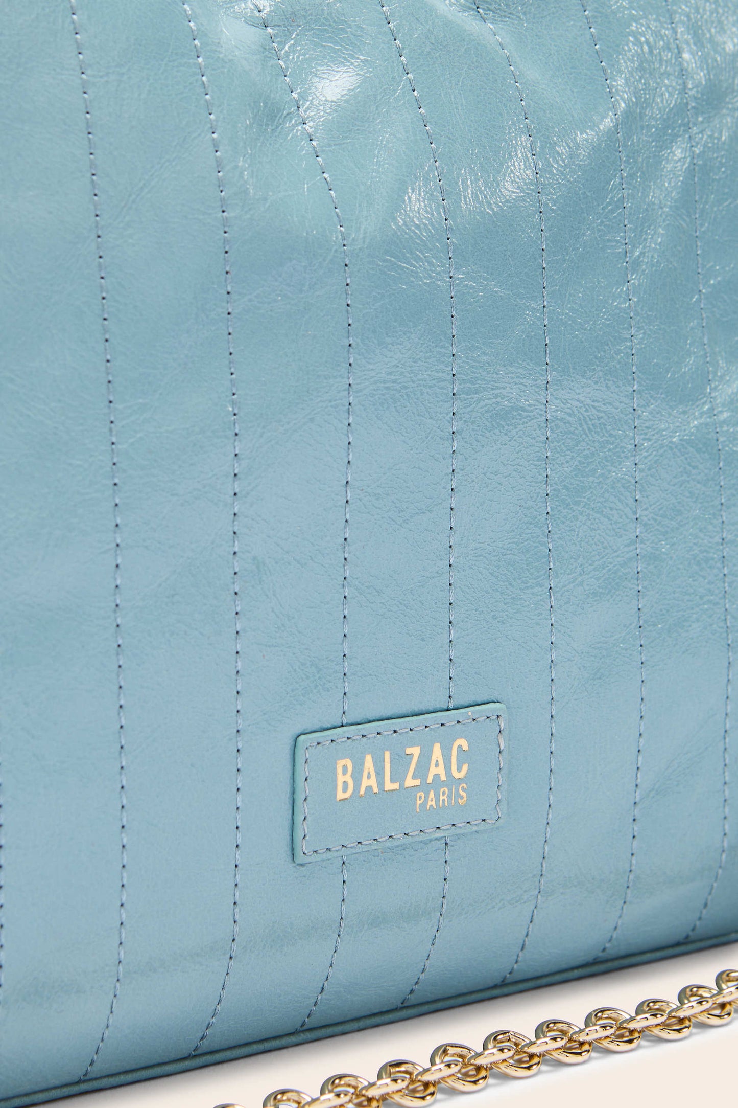 Amaïa crinkled patent sky blue bag