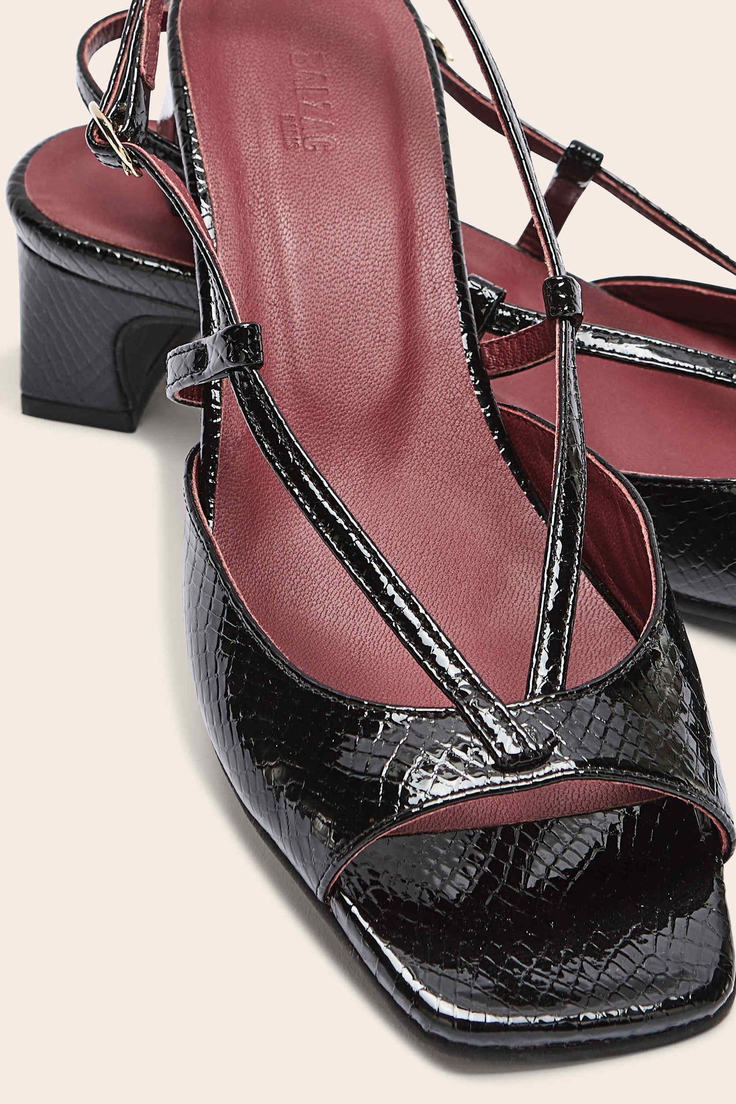 Black embossed patent leather Tella sandals