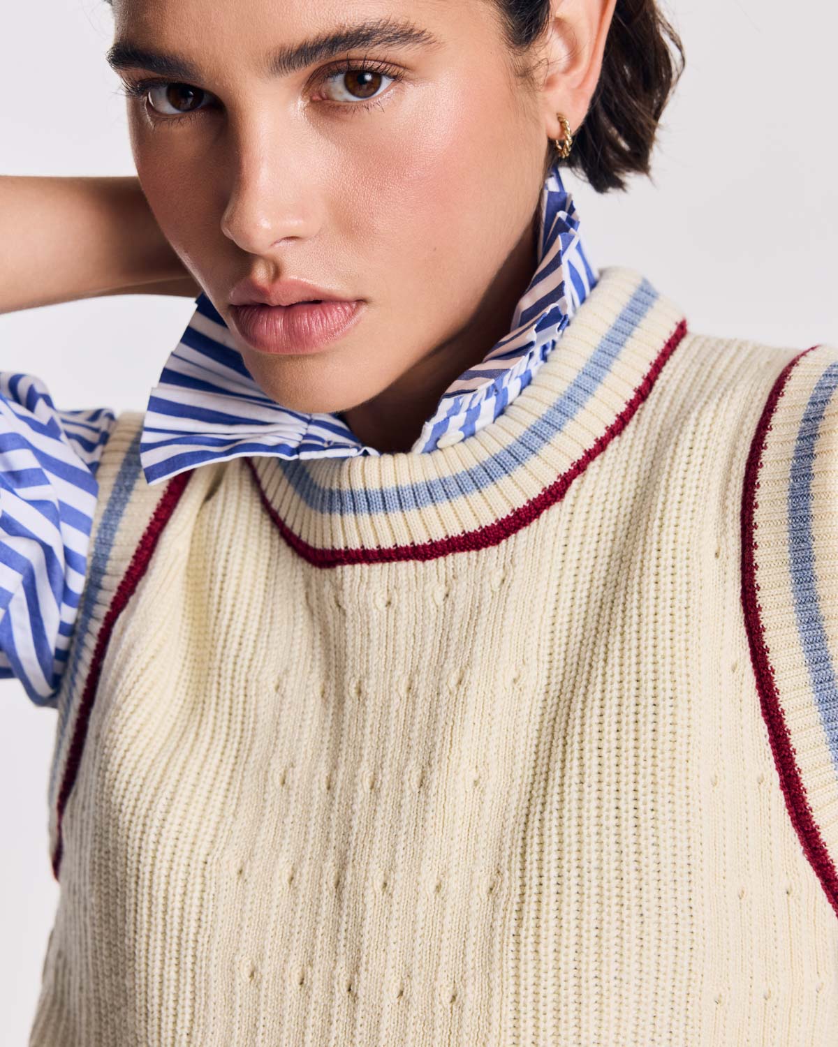 Ecru Pearl sweater with blue and red trim