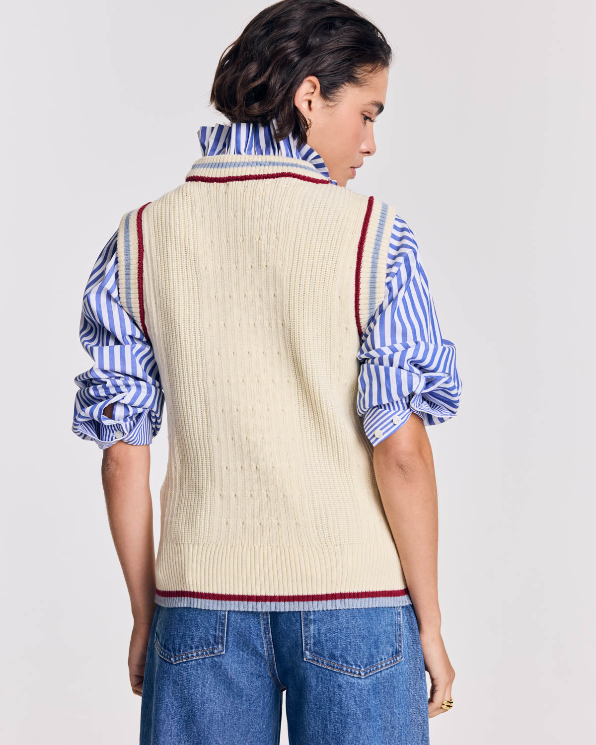 Ecru Pearl sweater with blue and red trim