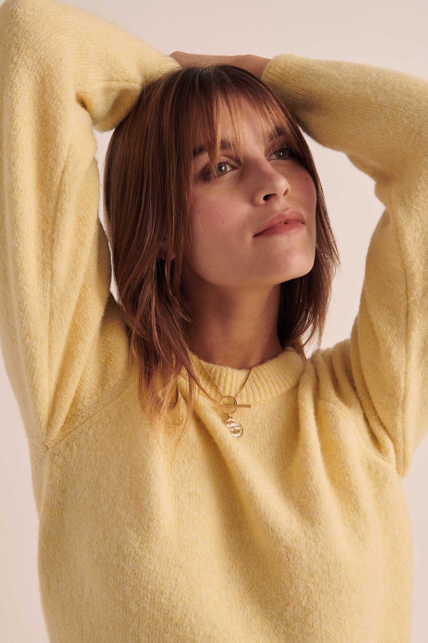 Pale yellow Comie sweater