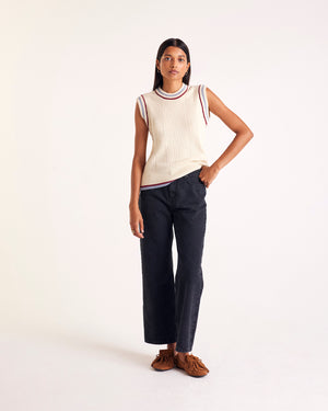 Ecru Pearl sweater with blue and red trim