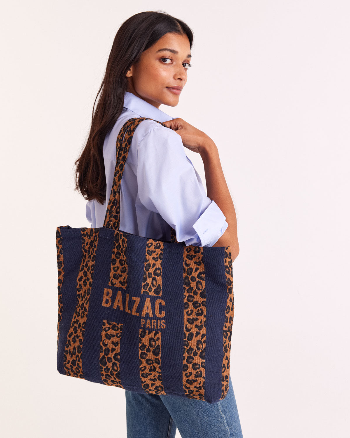 Navy and leopard striped tote bag
