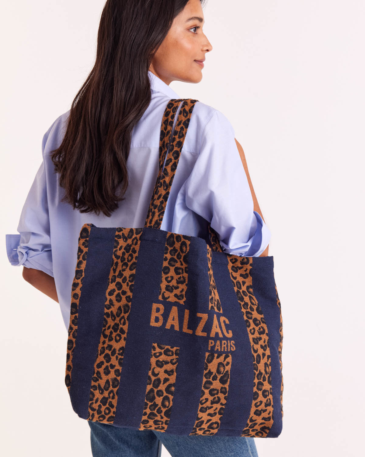 Navy and leopard striped tote bag