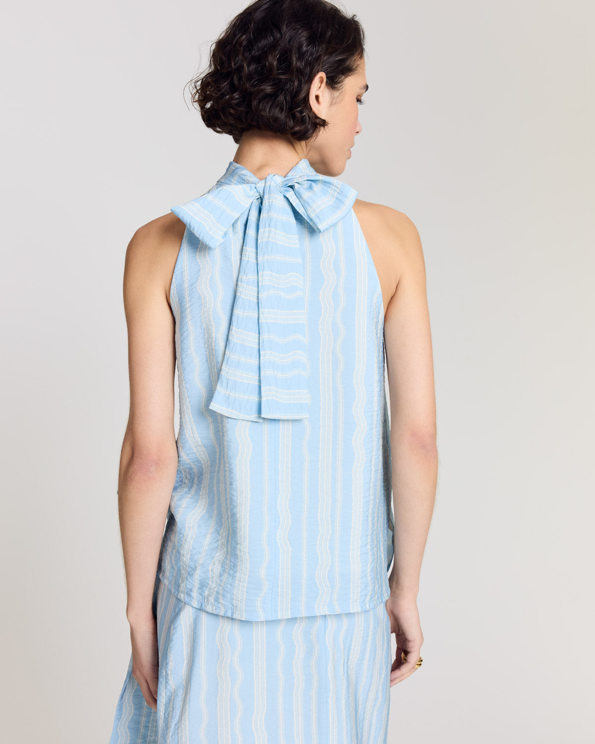 Top Arielle rayures onde fond bleu