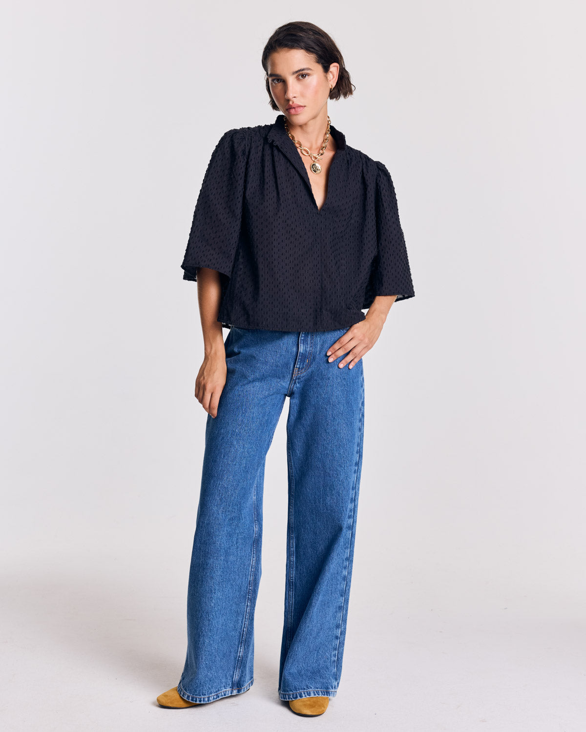 Janelle navy blue swiss dot blouse