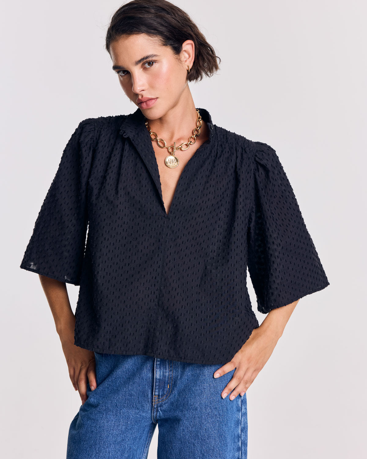 Janelle navy blue swiss dot blouse