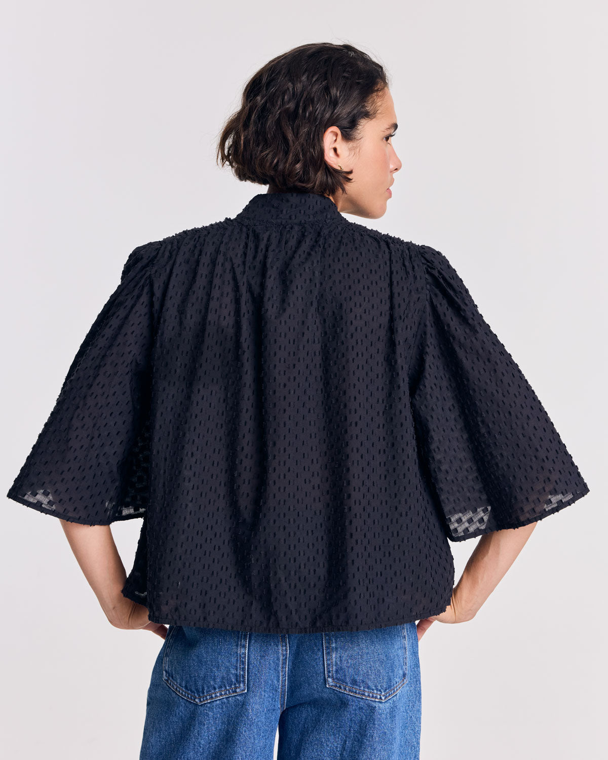 Janelle navy blue swiss dot blouse