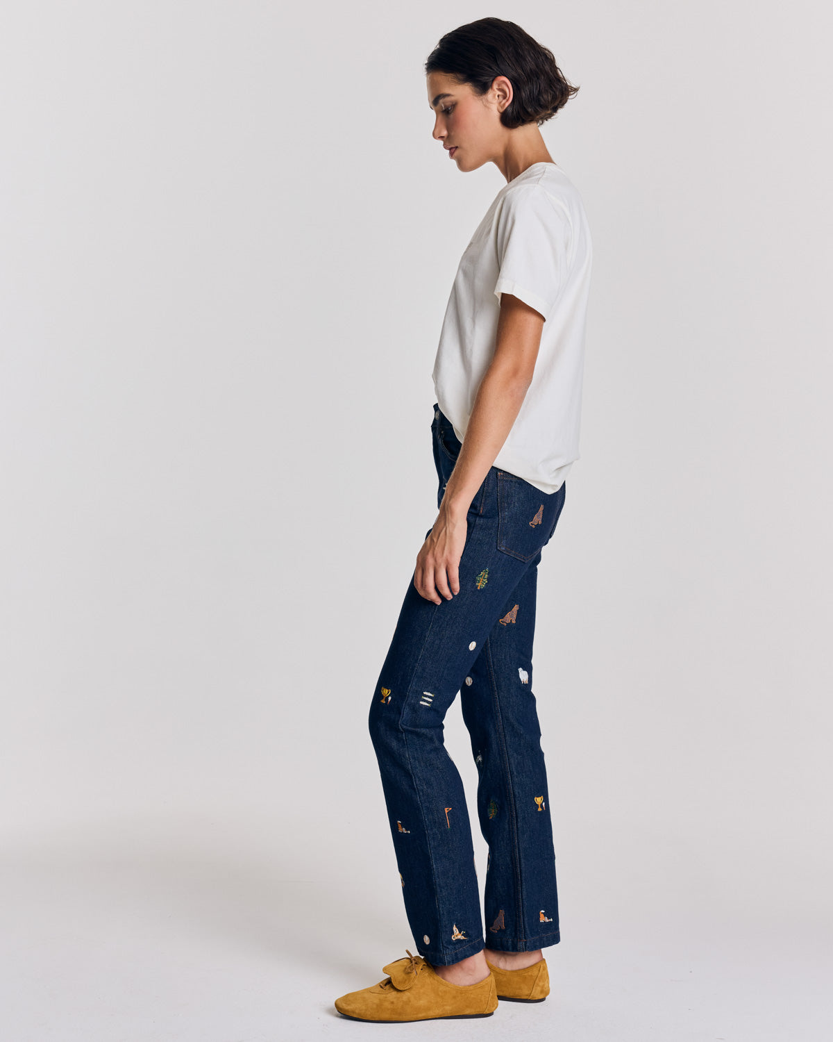 Blue raw denim jeans and ivy embroidery