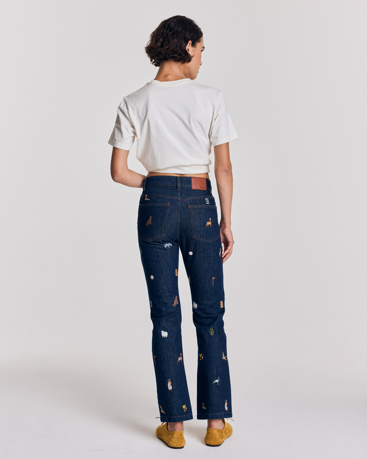 Blue raw denim jeans and ivy embroidery