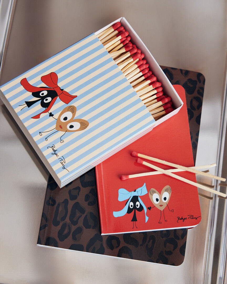 Ecru and blue striped matches