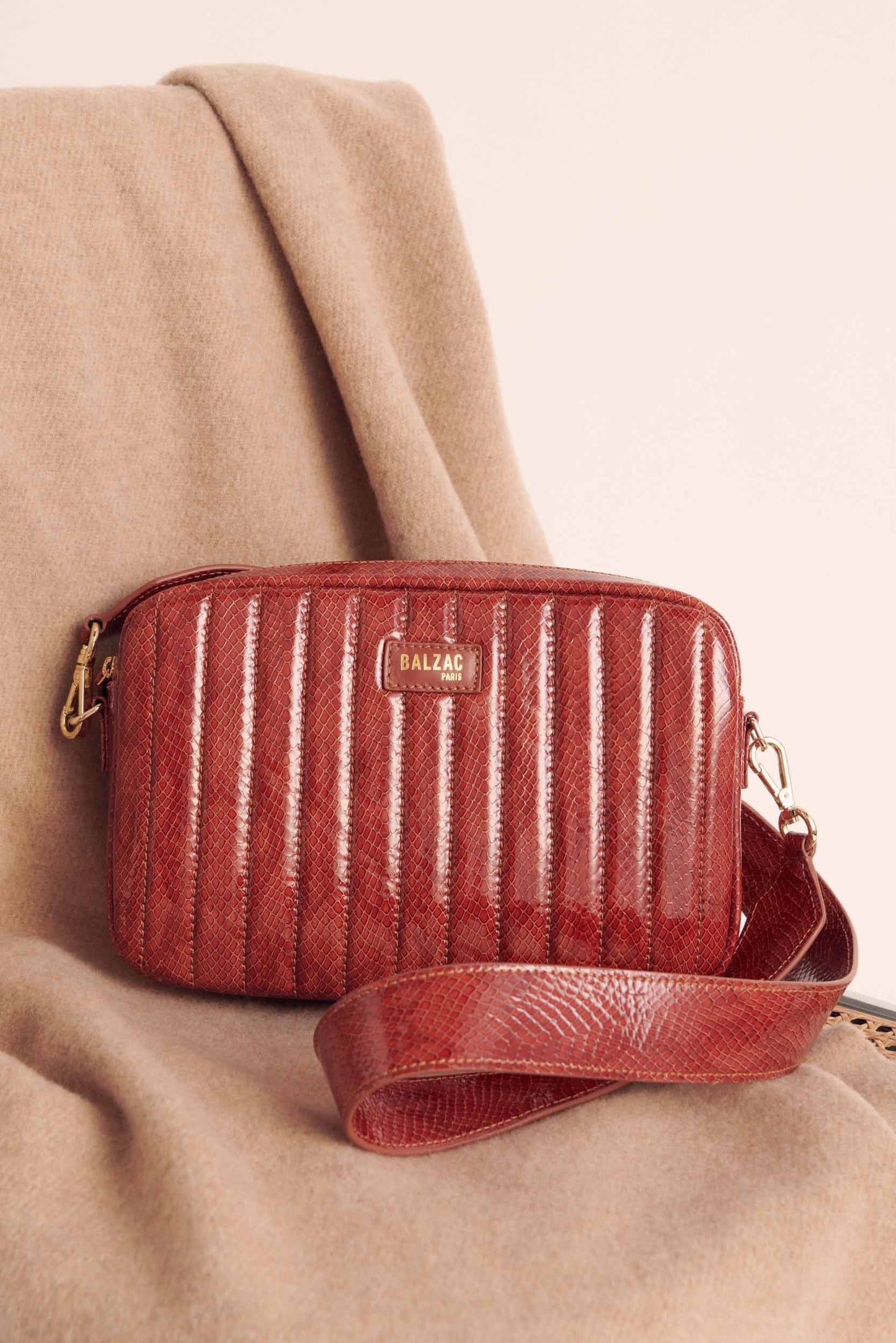 Grand César embossed cognac varnish bag