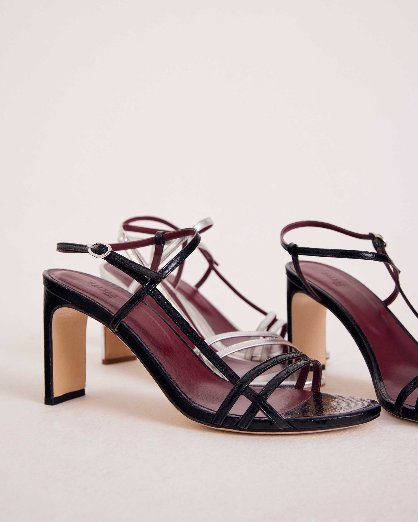 Cornelia sandals in black embossed patent leather