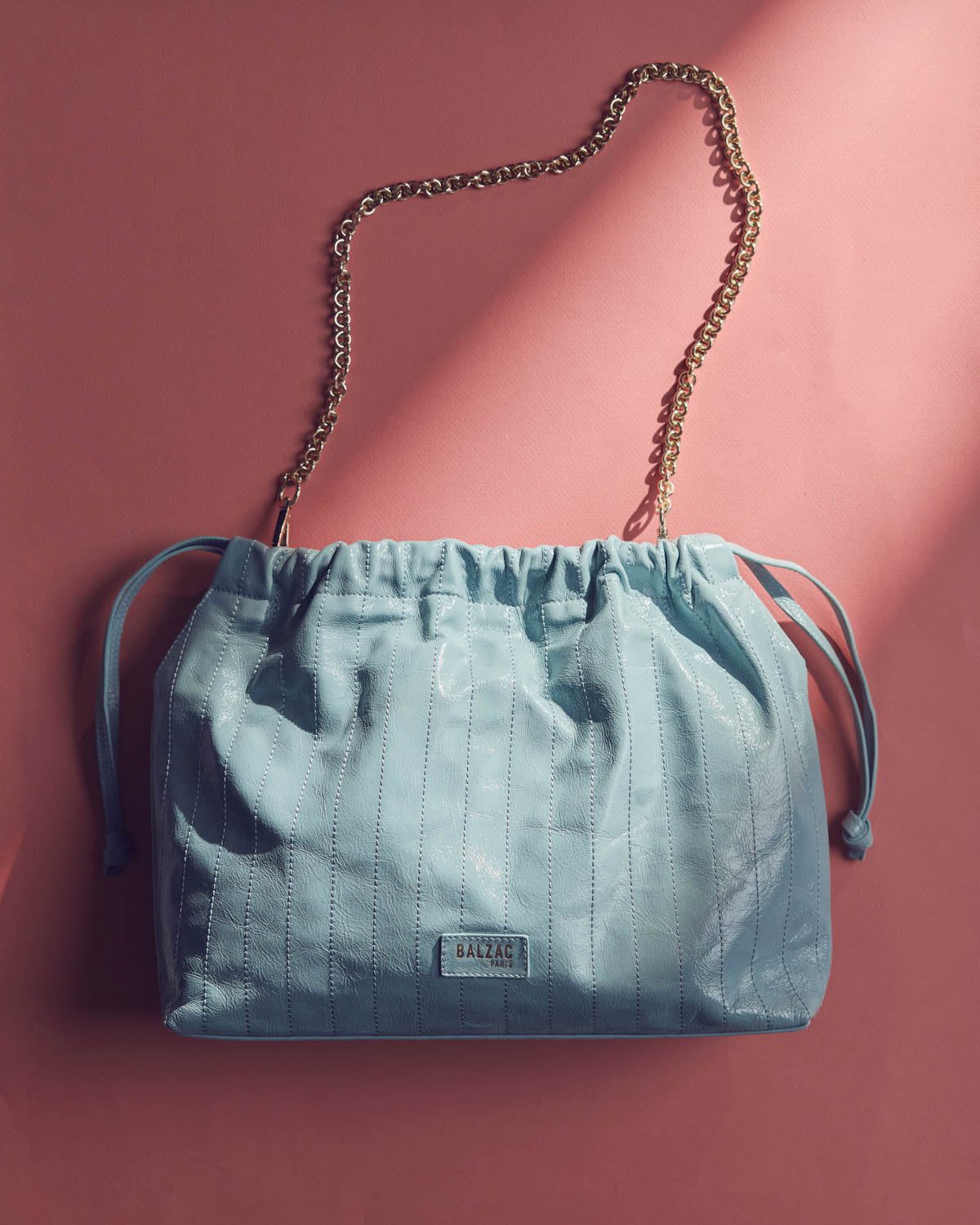 Amaïa crinkled patent sky blue bag