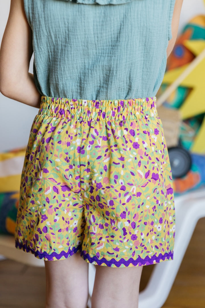 Shorts Curieux printed kyrielle of flowers