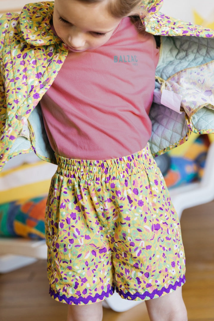 Shorts Curieux printed kyrielle of flowers