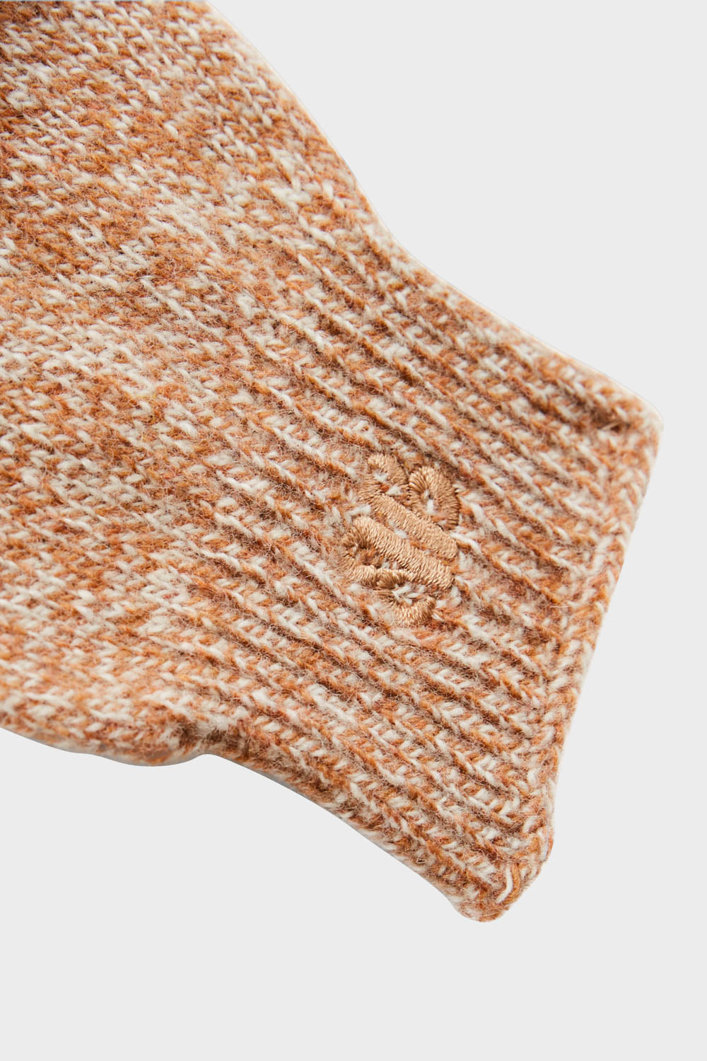 Camel-colored suede gloves