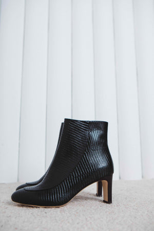 Swann black ankle boots with reptile embossing