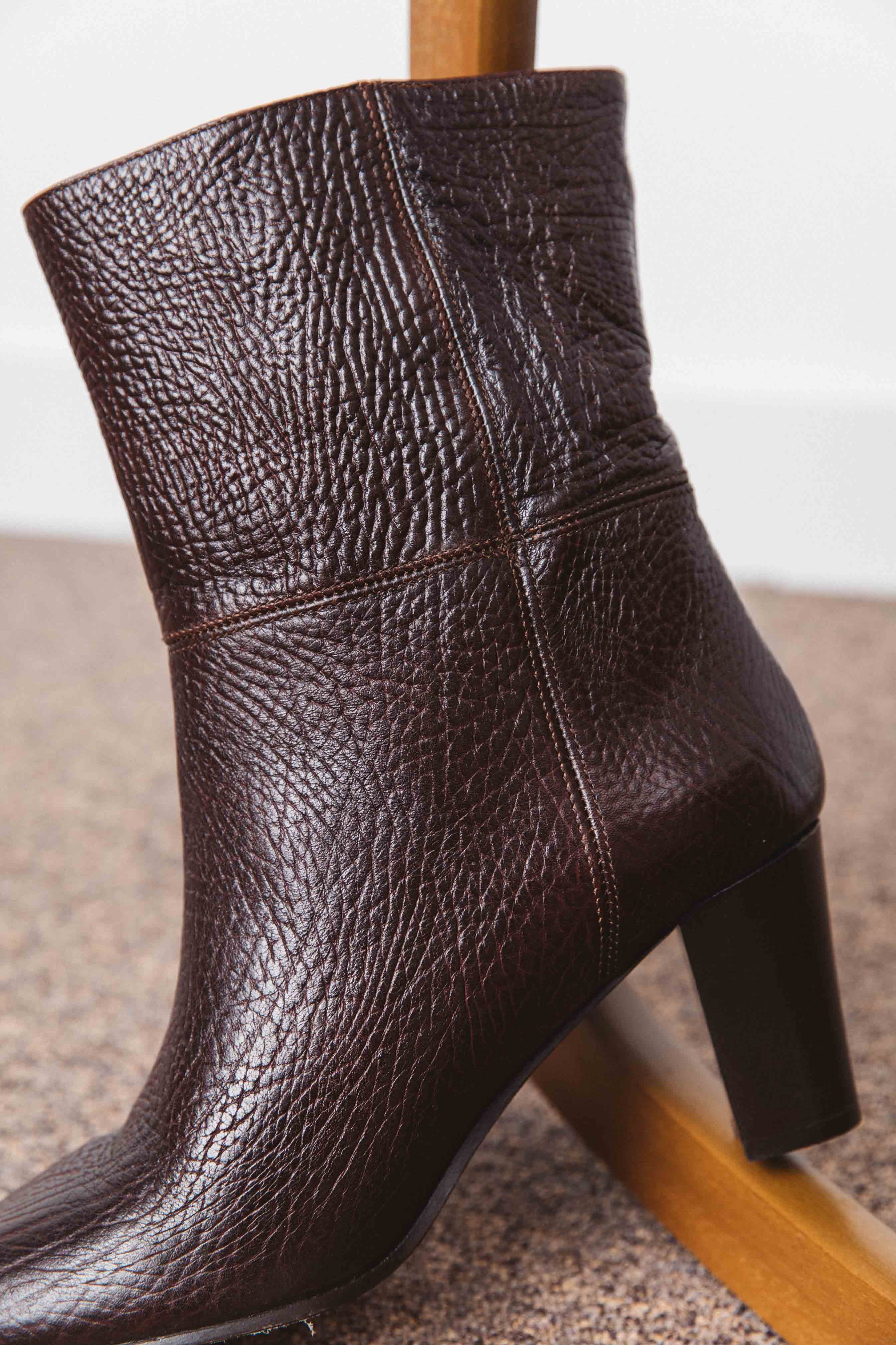Engraved brown Nivia ankle boots